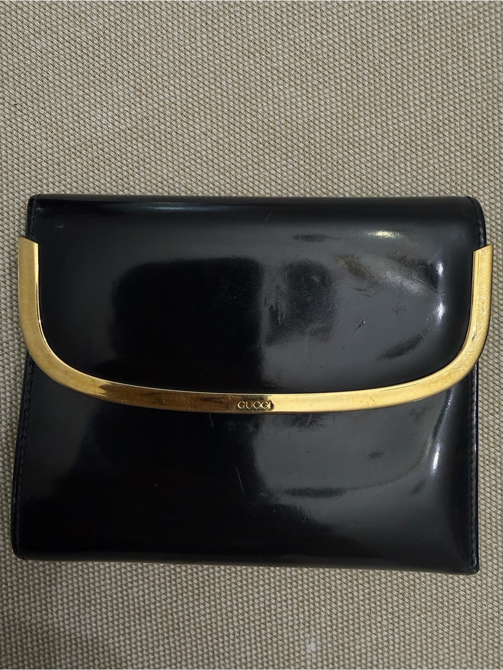 Gucci Black Leather Wallet with Gold Trim